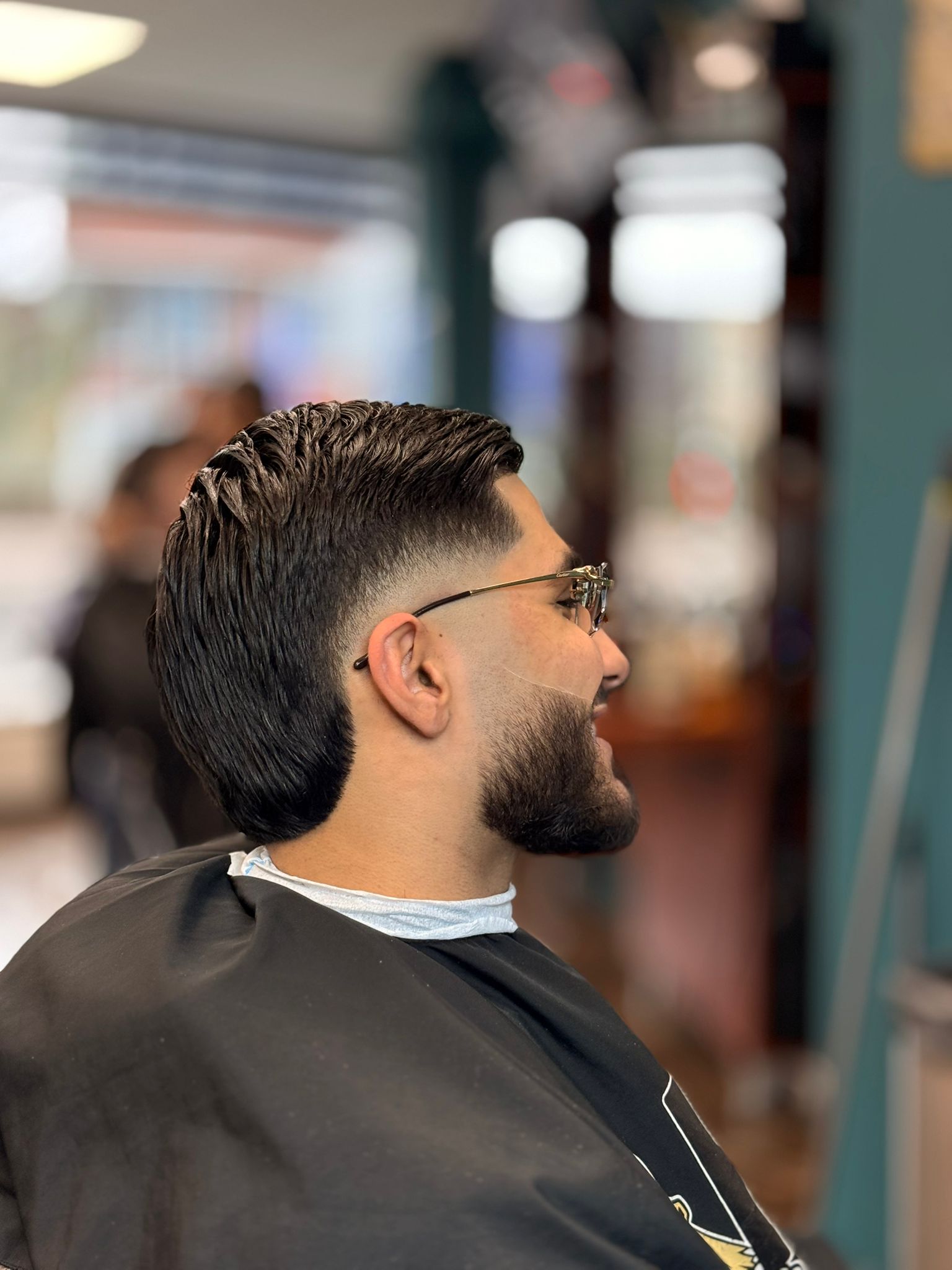 Fade haircut met overloop